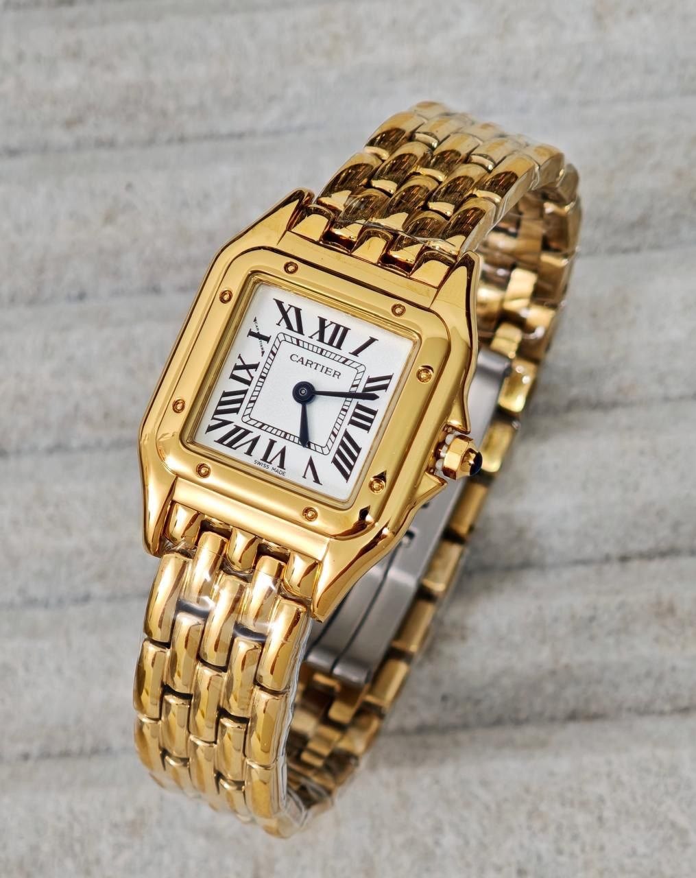 Montre élégante pour femme, coloris doré